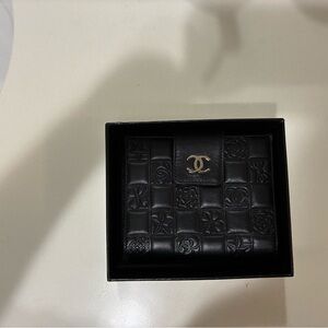 Authentic CHANEL Black Lucky Charm Embossed Wallet